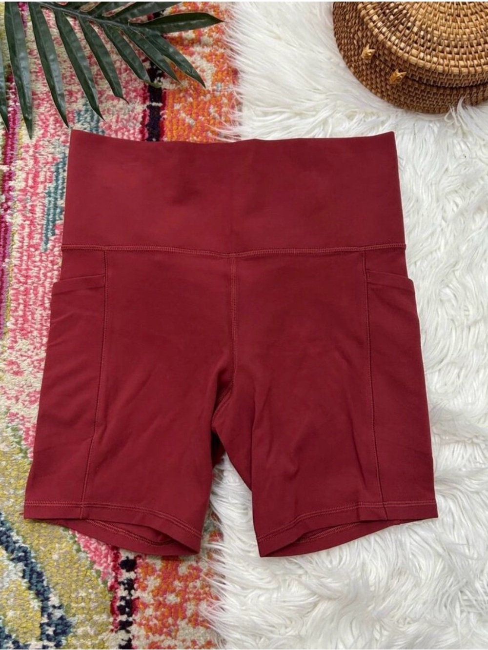 Athleta Salutation Stash Pocket II 7" Shorts Brick Red